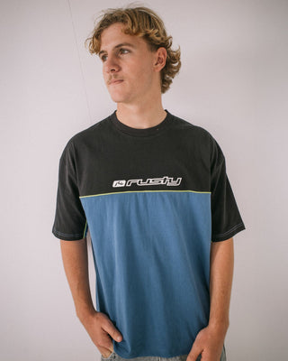 Man wearing Infinity Short Sleeve Tee in Atlantic Blue