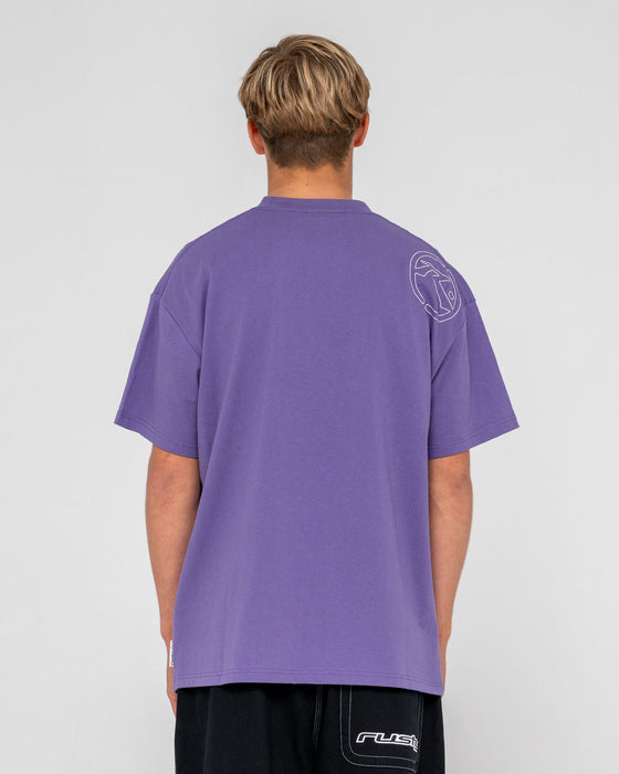 man-wearing-spraya-short-sleeve-tee-in-purple-ash