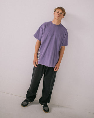 Man wearing Spraya Short Sleeve Tee in Purple Ash