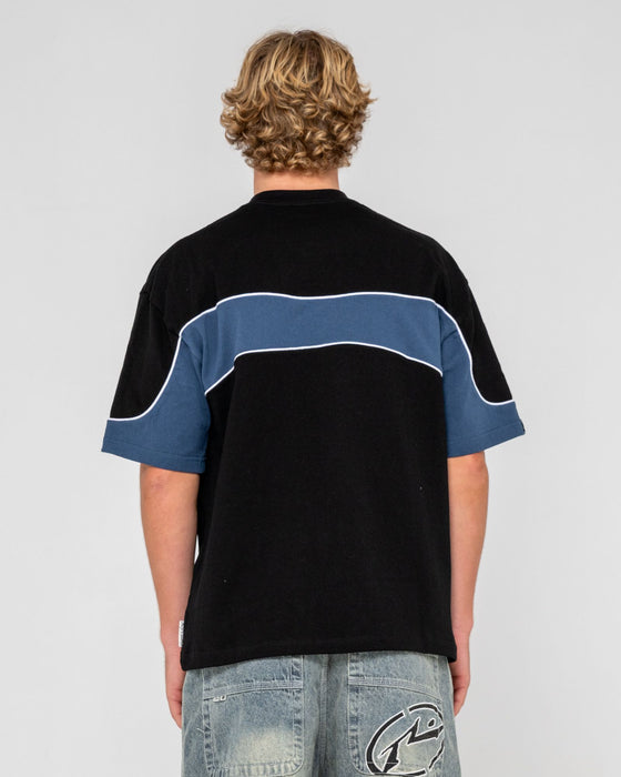 man-wearing-kinetic-short-sleeve-heavy-tee-in-black
