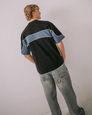 Man wearing Kinetic Short Sleeve Heavy Tee in Black