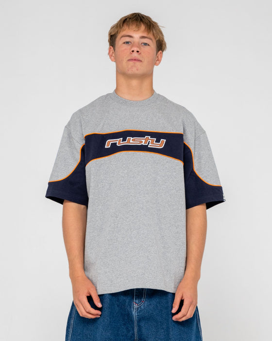 man-wearing-kinetic-short-sleeve-heavy-tee-in-grey-marle