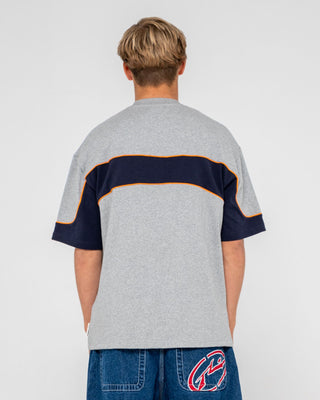 Man wearing Kinetic Short Sleeve Heavy Tee in Grey Marle