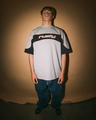 Man wearing Kinetic Short Sleeve Heavy Tee in Grey Marle