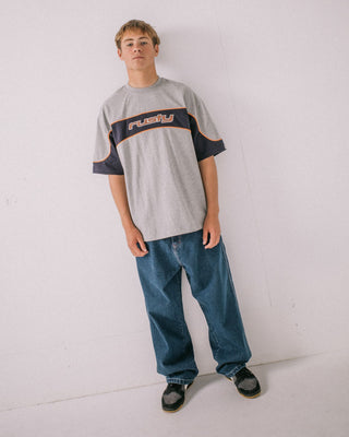 Man wearing Kinetic Short Sleeve Heavy Tee in Grey Marle