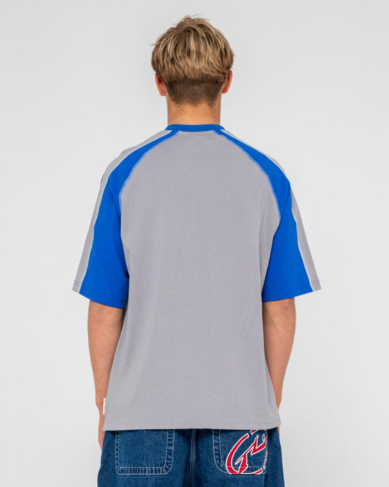 man-wearing-fade-r-short-sleeve-tee-in-stone-grey