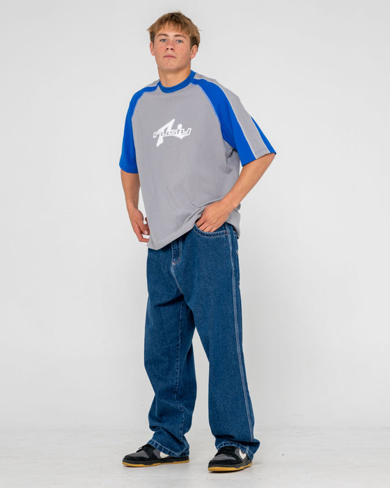 man-wearing-fade-r-short-sleeve-tee-in-stone-grey