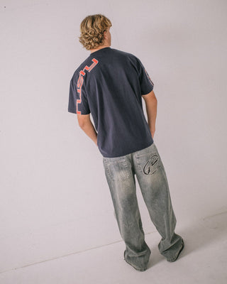 Man wearing Glaze-r Short Sleeve Tee in Navy Blue