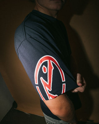 Man wearing Glaze-r Short Sleeve Tee in Navy Blue