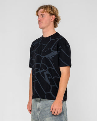 Man wearing Taipan Short Sleeve Tee in Black