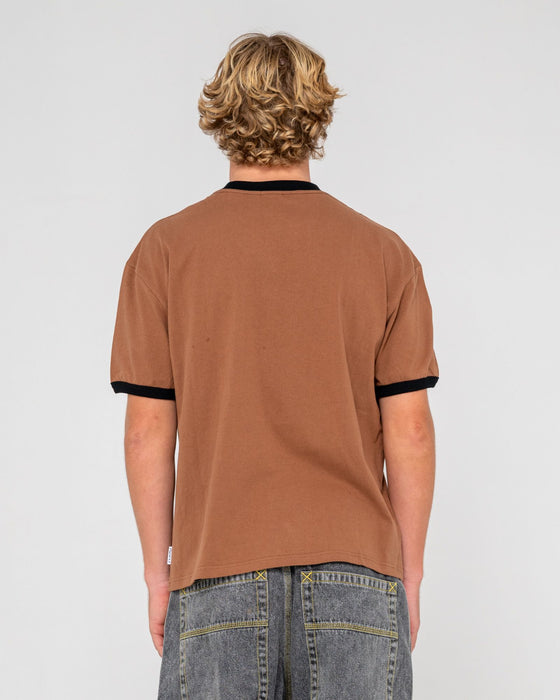 man-wearing-riot-ringer-short-sleeve-tee-in-pinecone