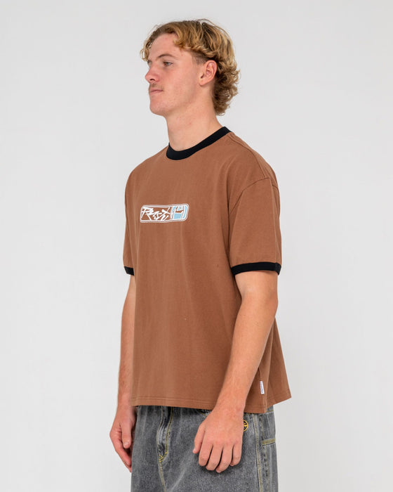 man-wearing-riot-ringer-short-sleeve-tee-in-pinecone