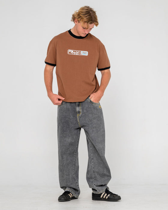 man-wearing-riot-ringer-short-sleeve-tee-in-pinecone