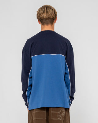 Man wearing Infinity Long Sleeve Tee in Atlantic Blue