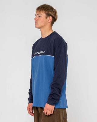 Man wearing Infinity Long Sleeve Tee in Atlantic Blue