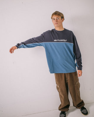 Man wearing Infinity Long Sleeve Tee in Atlantic Blue