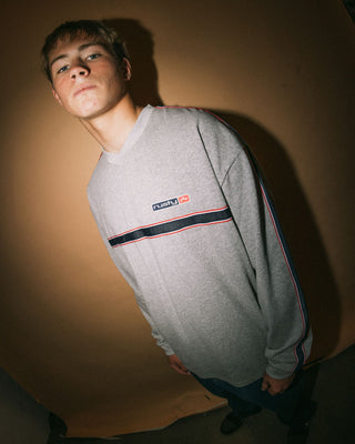 Man wearing V-money Long Sleeve Tee in Grey Marle