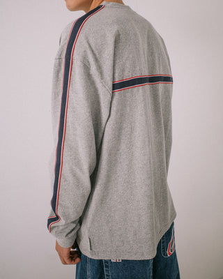 Man wearing V-money Long Sleeve Tee in Grey Marle