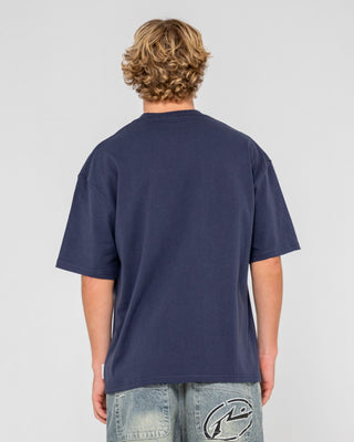 Man wearing Dr. Dot Short Sleeve Tee in Dark Blue