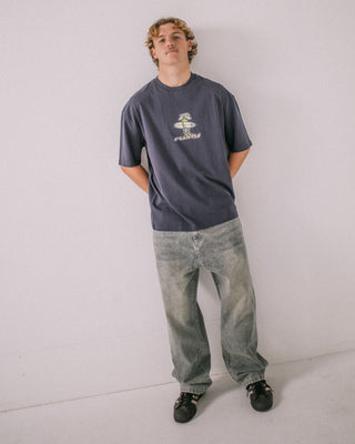 Man wearing Dr. Dot Short Sleeve Tee in Dark Blue