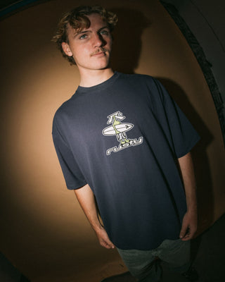 Man wearing Dr. Dot Short Sleeve Tee in Dark Blue