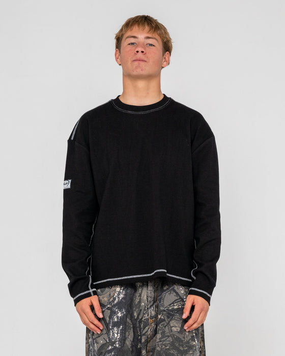 man-wearing-slack-jack-long-sleeve-heavy-tee-in-black