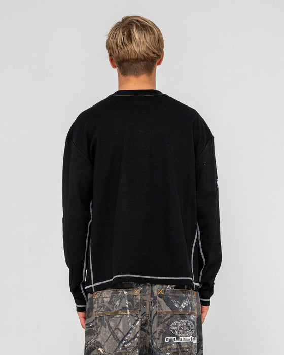 man-wearing-slack-jack-long-sleeve-heavy-tee-in-black