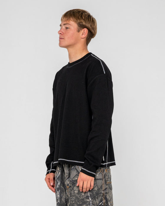 man-wearing-slack-jack-long-sleeve-heavy-tee-in-black