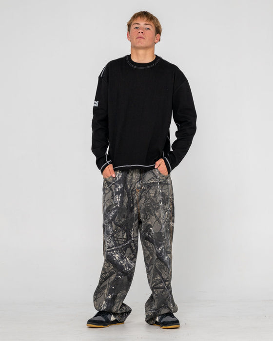 man-wearing-slack-jack-long-sleeve-heavy-tee-in-black