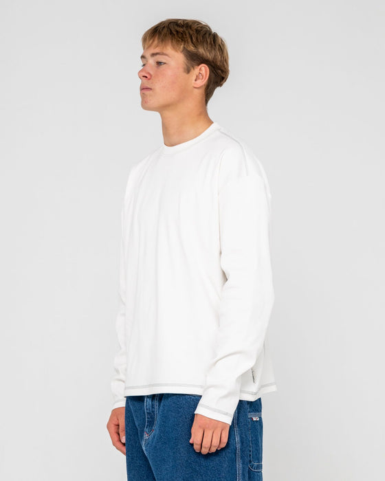 man-wearing-slack-jack-long-sleeve-heavy-tee-in-white