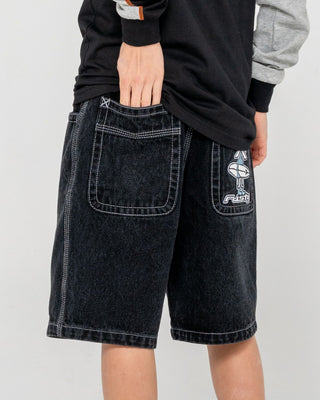 Boy wearing Dr. Dot Baggy Jort Boys in Black Out