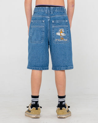 Boy wearing Dr. Dot Baggy Jort Boys in Middy Blue