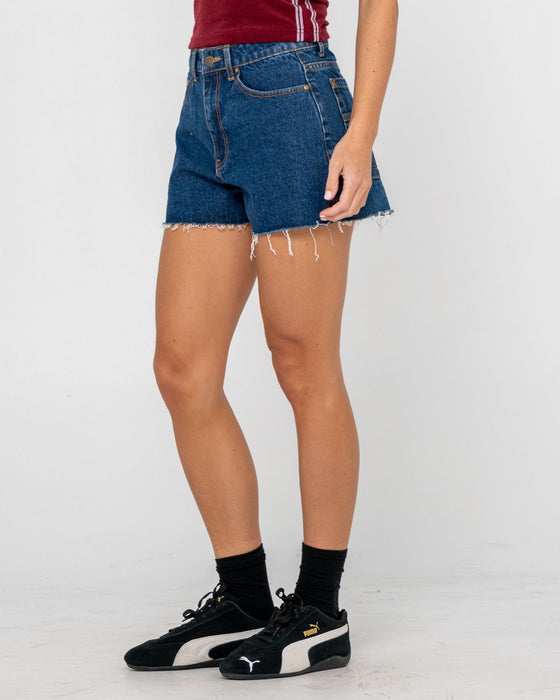 woman-wearing-penny-kick-flare-denim-short-in-deep-sea-blue
