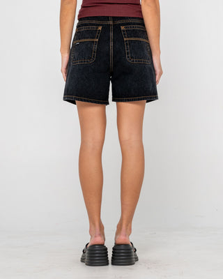 Woman wearing Cyprus High Denim Short in Black Out