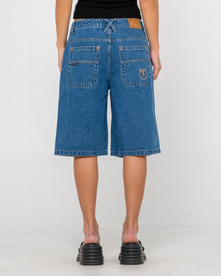 Woman wearing Bethany Baggy Low Rise Denim Jort in Middy Blue