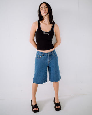 Woman wearing Bethany Baggy Low Rise Denim Jort in Middy Blue