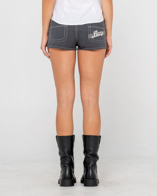 Woman wearing Dirtbag Cargo Low Rise Mini Short in Carbon