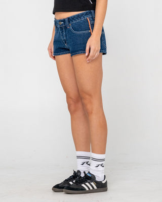 Woman wearing Flip Mommy Low Rise Micro Mini Short in Deep Sea Blue / Orange