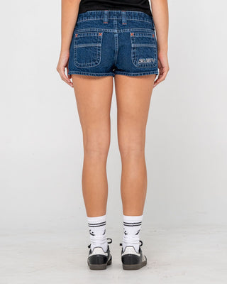 Woman wearing Flip Mommy Low Rise Micro Mini Short in Deep Sea Blue / Orange