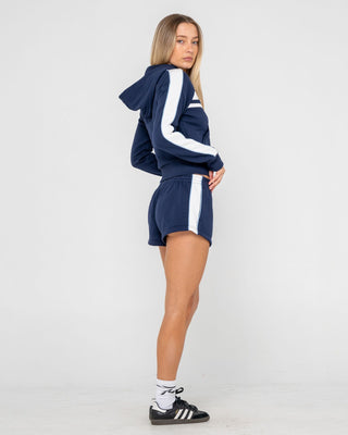 Woman wearing Retro Lines Mini Fleece Short in Navy Blue