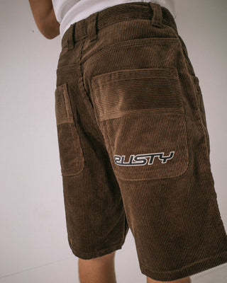 Man wearing Flip Daddy Tapeless Cord Short in Dark Choc