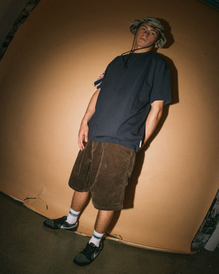 Man wearing Flip Daddy Tapeless Cord Short in Dark Choc