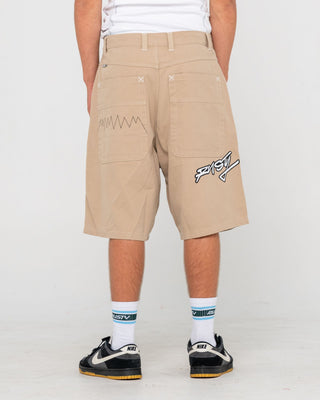 Man wearing Step-stone Baggy Short in Abbey Stone