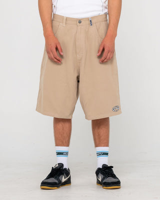 Man wearing Step-stone Baggy Short in Abbey Stone