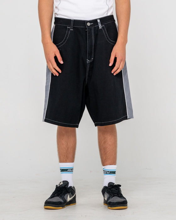 man-wearing-flip-daddy-taped-baggy-short-in-black