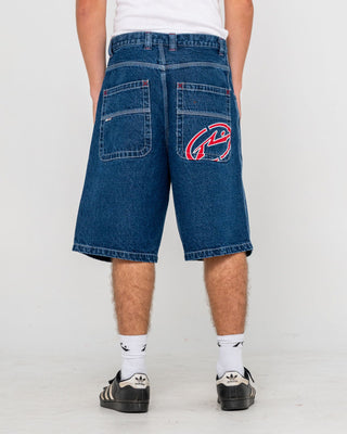 Man wearing Turbo Baggy Jort in Deep Sea Blue