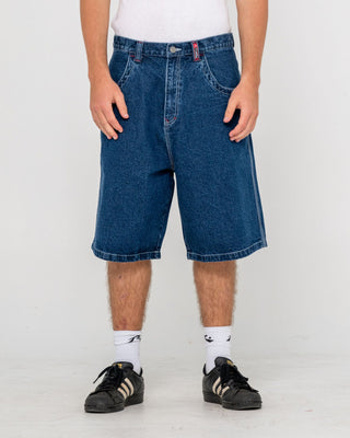 Man wearing Turbo Baggy Jort in Deep Sea Blue
