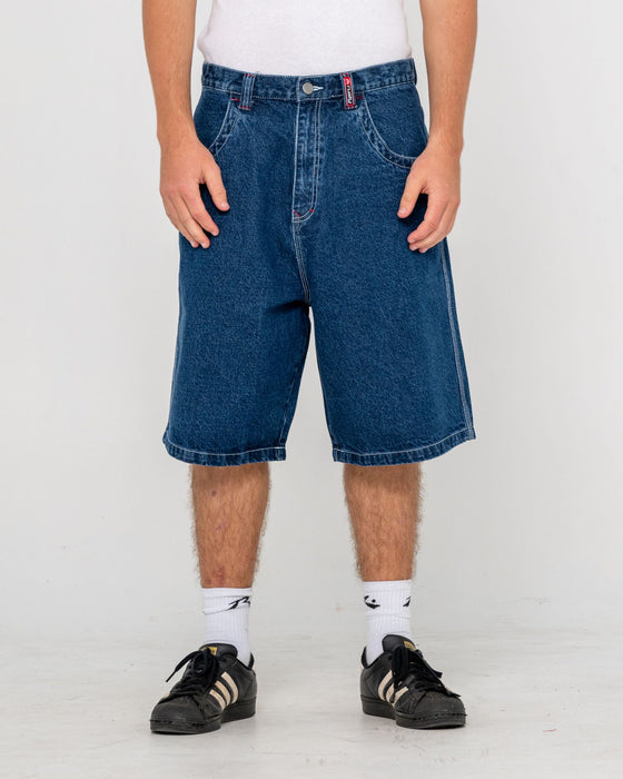man-wearing-turbo-baggy-jort-in-deep-sea-blue