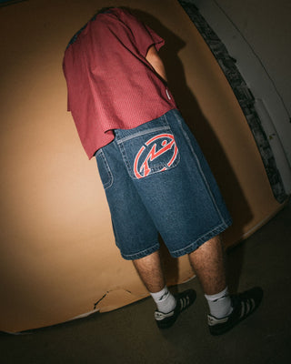 Man wearing Turbo Baggy Jort in Deep Sea Blue