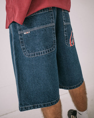 Man wearing Turbo Baggy Jort in Deep Sea Blue